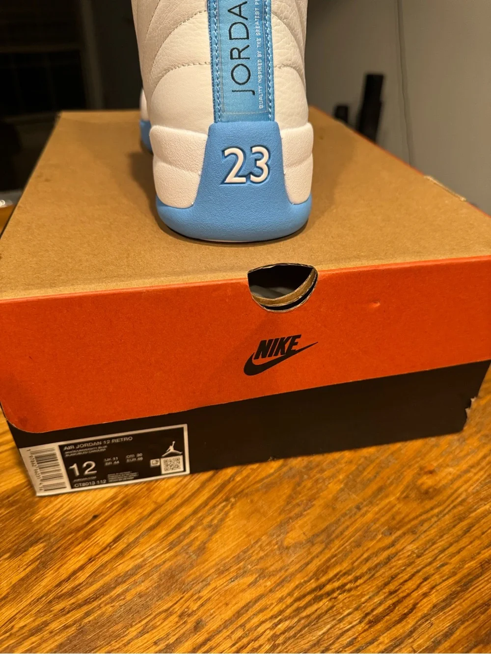 Jordan Men’s White and Light Blue High-Top Sneakers